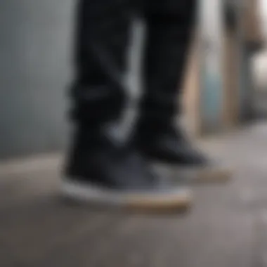 A group of skaters wearing black Adidas shoes in an urban setting