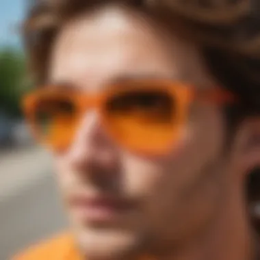 A collection of different styles of affordable orange sunglasses