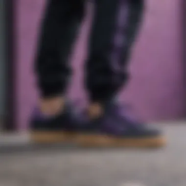 A fashionable streetwear ensemble highlighting black and purple Adidas as a focal point.