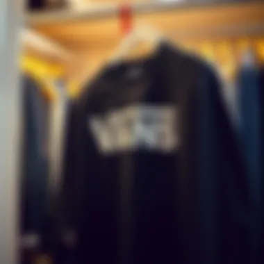 A well-maintained black Vans shirt hung in a stylish wardrobe