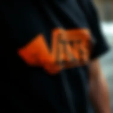 Close-up of the unique design elements of a black Vans shirt