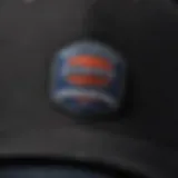 A close-up of a Dickies cap showcasing its stitching and material texture.