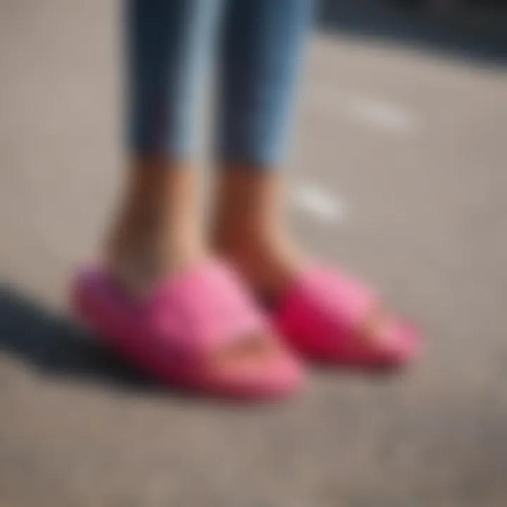 Fashionable display of hot pink Kappa slides with skate gear