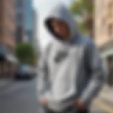 Skateboarder wearing the hoodie in an urban setting