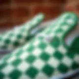 Close-up view of the Checkerboard Slip-On Vans in green, highlighting the unique texture and pattern.