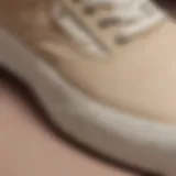 A close-up view of beige Vans showcasing their unique texture and design.