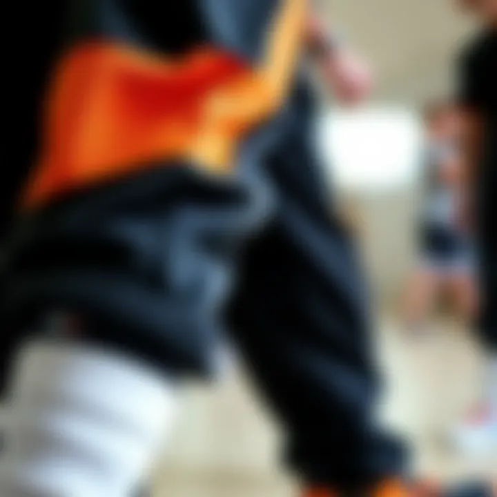 Close-up of fabric texture and design details of joggers.