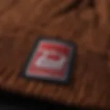 Detailed view of the Herschel Supply Co beanie showcasing its texture