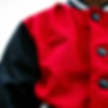 Design Details of the Red and Black Letterman Jacket Close-up of the red and black letterman jacket details, emphasizing its design elements and craftsmanship.