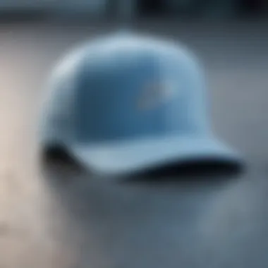 Intricate Design of the Light Blue Nike Hat A close-up view of the light blue Nike hat showcasing its intricate design and logo.