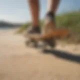 A sleek one wheel beach skateboard on sandy terrain