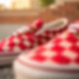 Detailed Look at Vans Slip-Ons Design Close-up view of red and white Vans slip-ons showcasing their unique design.