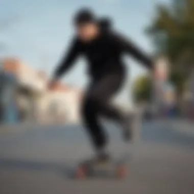 A skater performing tricks while wearing black sweatpants