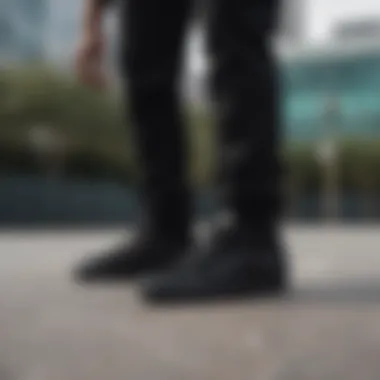 A group of skaters showcasing their all black low top Vans