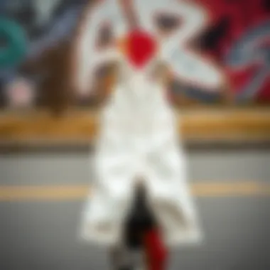 A pair of white denim overalls hanging on a skateboard