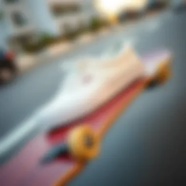 All white Vans on a skateboard deck