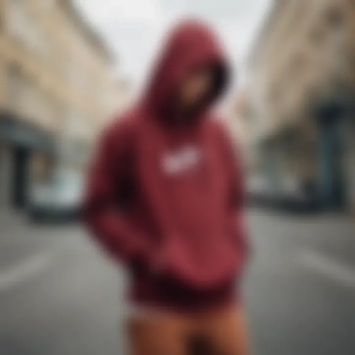 Burgundy Nike hoodie in an urban skateboarding environment