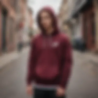 Fashionable streetwear ensemble featuring the burgundy Nike hoodie