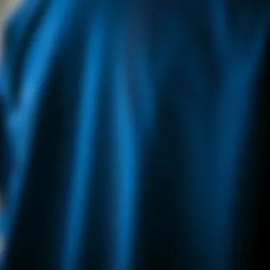A close-up view of the dark blue Champion sweatshirt showcasing its fabric texture