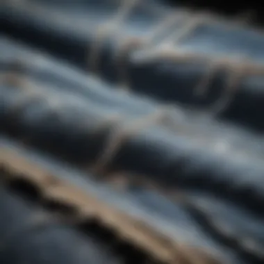 Close-up of the fabric texture and rips in a pair of jeans