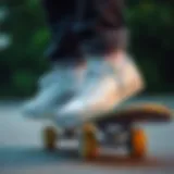 Stylish white reef shoes on a skateboard