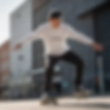 Skater performing a trick wearing a long sleeve white tee