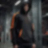 Stylish black and orange Nike hoodie on display