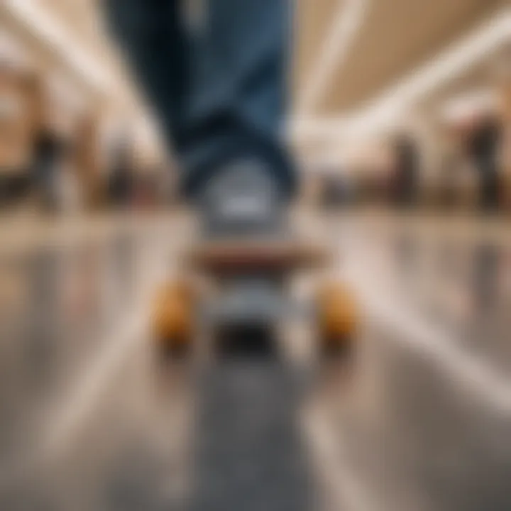 Close-up of a skateboard held in a mall grab position