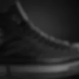 Close-up of black high top Converse showcasing texture and material quality