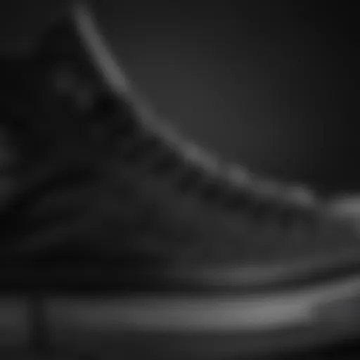 Close-up of black high top Converse showcasing texture and material quality