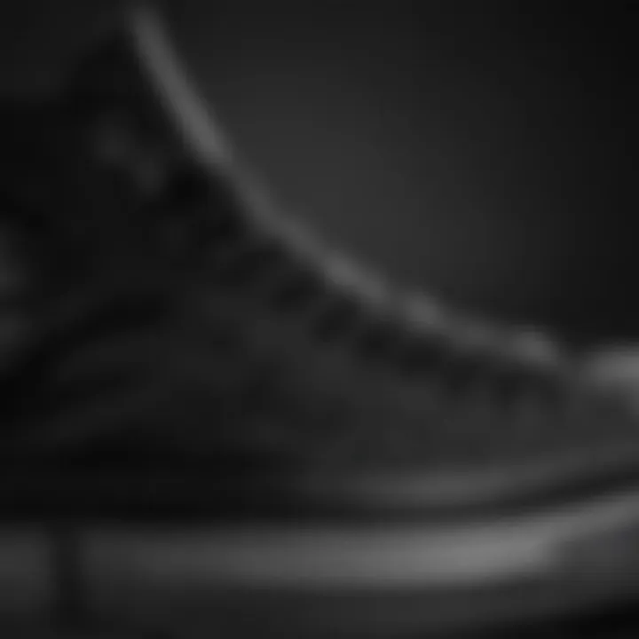 Close-up of black high top Converse showcasing texture and material quality