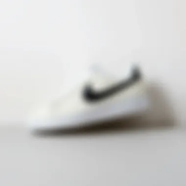 Minimalist Presentation of Iconic Sneakers Stylish white Nike shoes with black Swoosh against a minimalist background